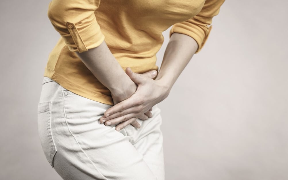 Bol u leđima na desnoj strani kihanja | Uzrok, dijagnoza, liječenje
